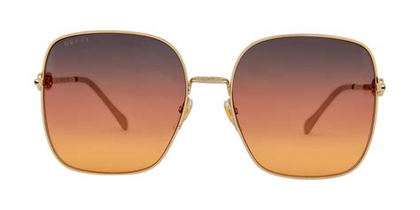 Gucci GG0879S 61 Brown & Gold Sunglasses.